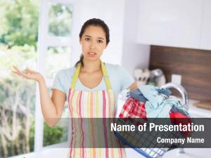 Woman puzzled young holding laundry
