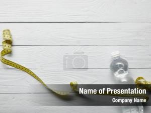 Plastic Bottle and Measuring Tape PowerPoint Template