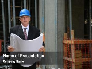 Blues contractor examining construction site