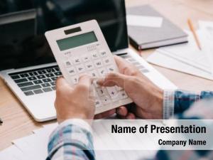 Man Working with Laptop and Calculator PowerPoint Template