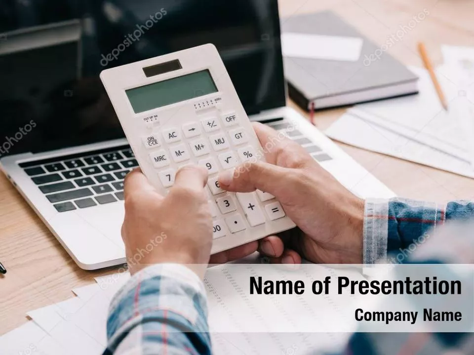 Man Working with Laptop and Calculator
