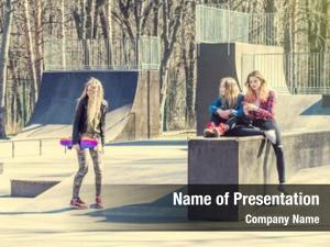 Friends young girl skateboarding park