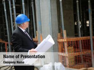 Blues contractor examining construction site