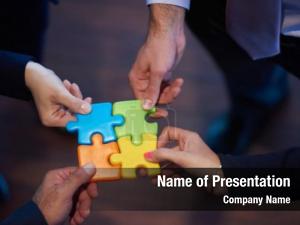 Group business people assembling jigsaw