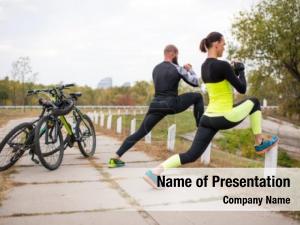 Limbering up couple cyclists before ride