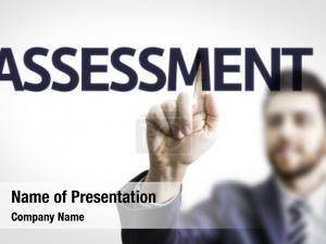 Pointing business man text: assessment