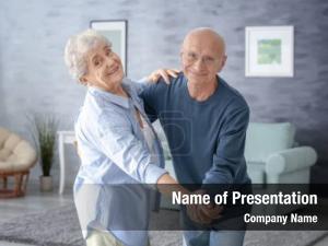 Couple cute elderly dancing home
