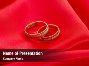 Wedding Rings On A Bright Red Background PowerPoint Template