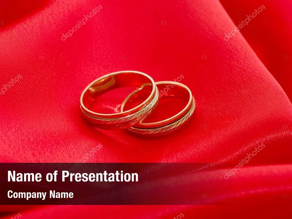 Wedding Rings On A Bright Red Background