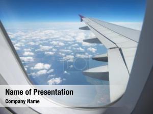 View of Plane Wing Through Porthole