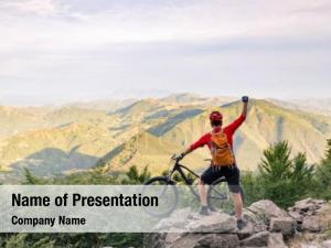 Biking Up Mountain PowerPoint Template