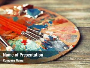 Close up Brushes with Colorful Oil Paints PowerPoint Template