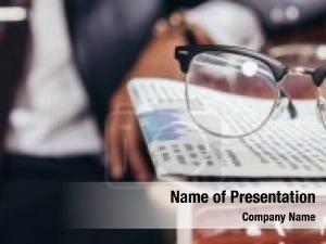 Glasses panoramic shot newspaper table PowerPoint Template