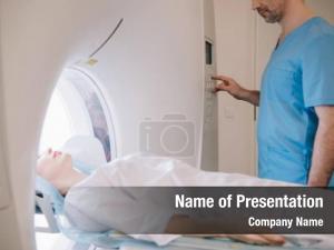 Radiologist partial view operating mri PowerPoint Template