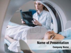 Radiologist selective focus holding x ray PowerPoint Template