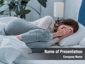 Lying depressed woman bed, crying