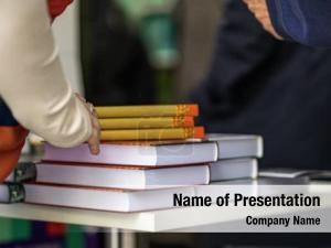 Book Stack and People PowerPoint Template